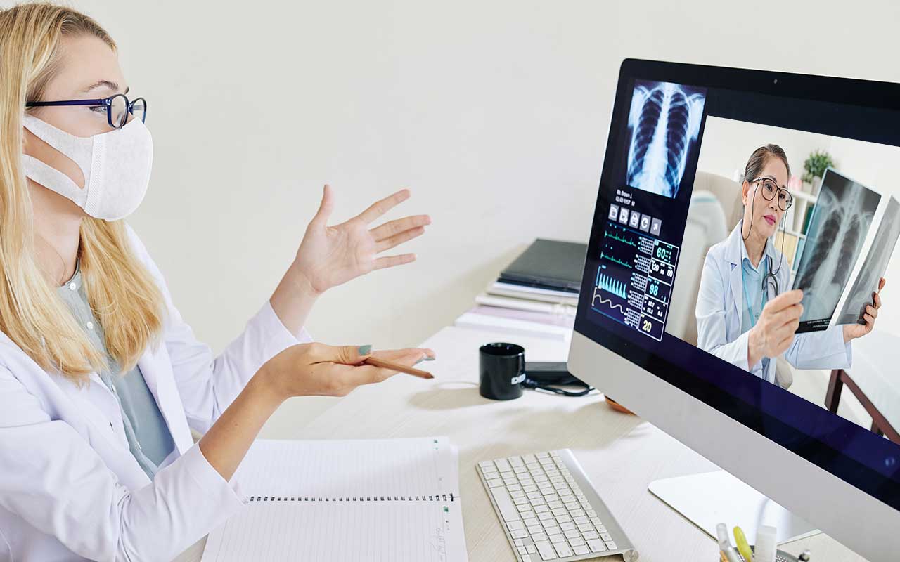 Doctors discussion on the video call using Quicklert Connected Healthcare Platform 