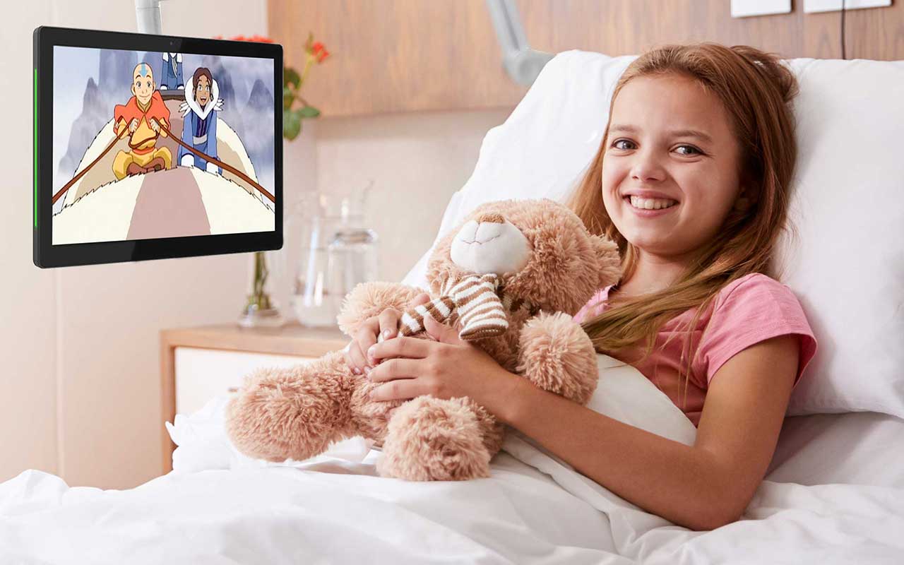 Little girl patient watching cartoons on the QBOX ConnecTab