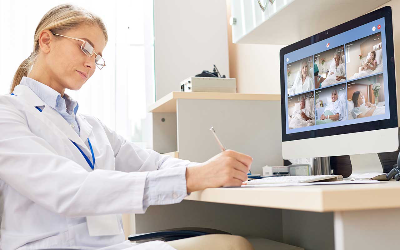 Nurse is monitoring and communicate with patients using QBOX ConnecTab